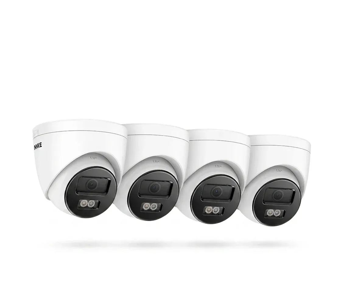 Four ANNKE dome security cameras on white